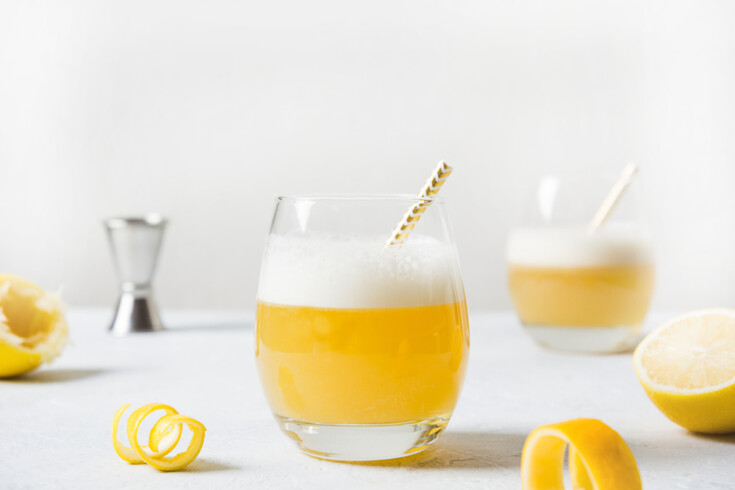 Whiskey sour cocktails with ingredients